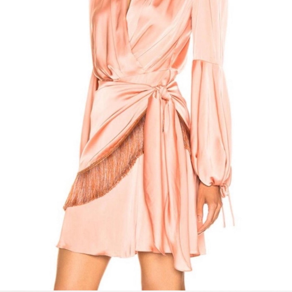 PATBO DRESS SIZE 8 fits a size 6 as well because of strings